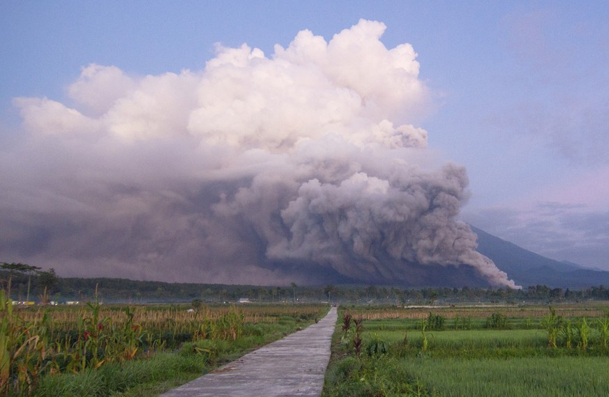 Mount Semeru releases volcanic materials during an eruption on Sunday, Dec. 4, 2022 in Lumajang, East java, Indonesia. Indonesia
