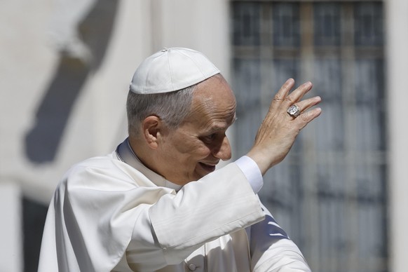 epa12874802 Pope Leo XIV waves as he leaves after his weekly general audience in Saint Peter?s Square, Vatican City, 08 April 2026. EPA/FABIO FRUSTACI