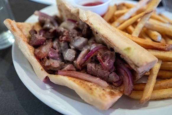 Close-up of cheesesteak with French fries at Grounds restaurant, Murphys, California, August 2, 2025. (Photo by Smith Collection/Gado/Getty Images)