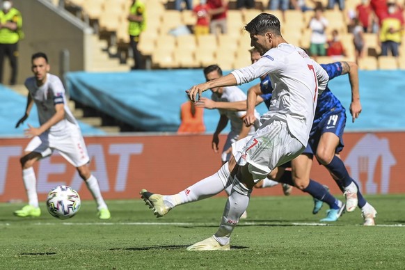 Spain&#039;s Alvaro Morata misses to score a penalty kick during the Euro 2020 soccer championship group E match at La Cartuja stadium in Seville, Spain, Wednesday, June 23, 2021. (David Ramos, Pool p ...