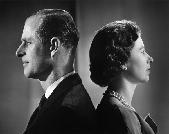 Queen Elizabeth II and Prince Philip, Duke of Edinburgh pose for a portrait, Buckingham Palace, London, December 1958. (Photo by Donald McKague/Michael Ochs Archives/Getty Images)