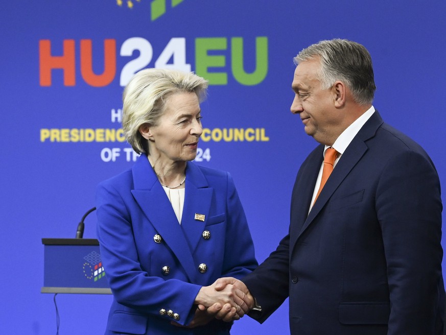 epa12813743 (FILE) - European Commission President Ursula von der Leyen (L) and Hungarian Prime Minister Viktor Orban shake hands in the presence of European Council President Charles Michel at the en ...