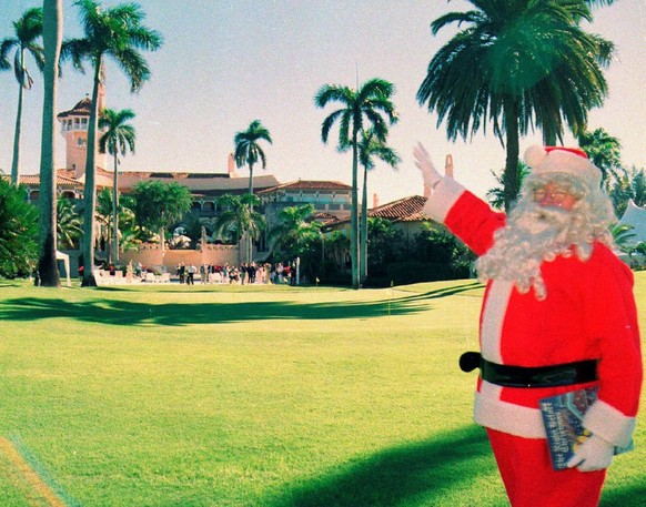 As part of a Christmas holiday event, Santa Claus poses on the grounds of the Mar-a-Lago Club, Palm Beach, Florida, December 6, 1997. (Photo by Davidoff Studios/Getty Images)