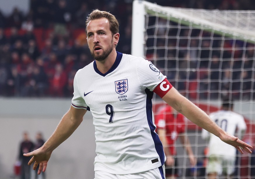 epa12529960 Harry Kane of England celebrates after scoring his second goal during the FIFA World Cup 26 UEFA qualifier between Albania and England in Tirana, Albania, 16 November 2025. EPA/GEORGI LICO ...