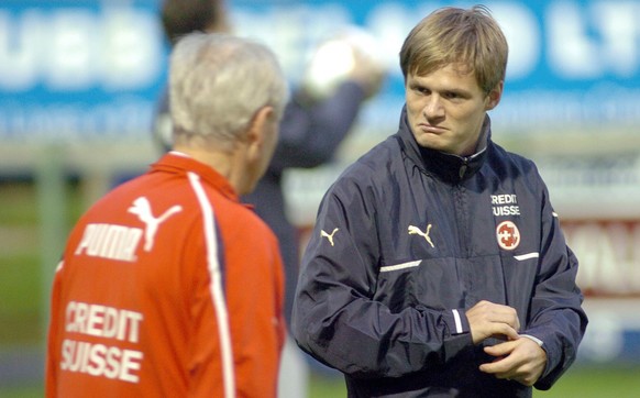 Johann Vogel, right, the Swiss Captain gets a word from the coach Jakob Koebi Kuhn before a training session at Belfield Dublin Monday Oct 10. 2005. Switzerland play the Rep. of Ireland in a crucial 2 ...
