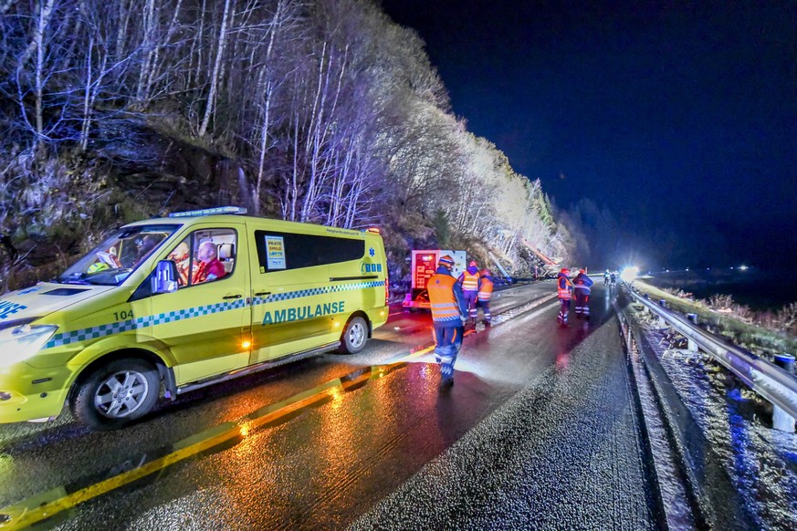 epa11680750 Emergency responders at the scene of a train derailment in Finneidfjord, Nordland municipality, Norway, on 24 October 2024. According to police, at least one person died and several others ...