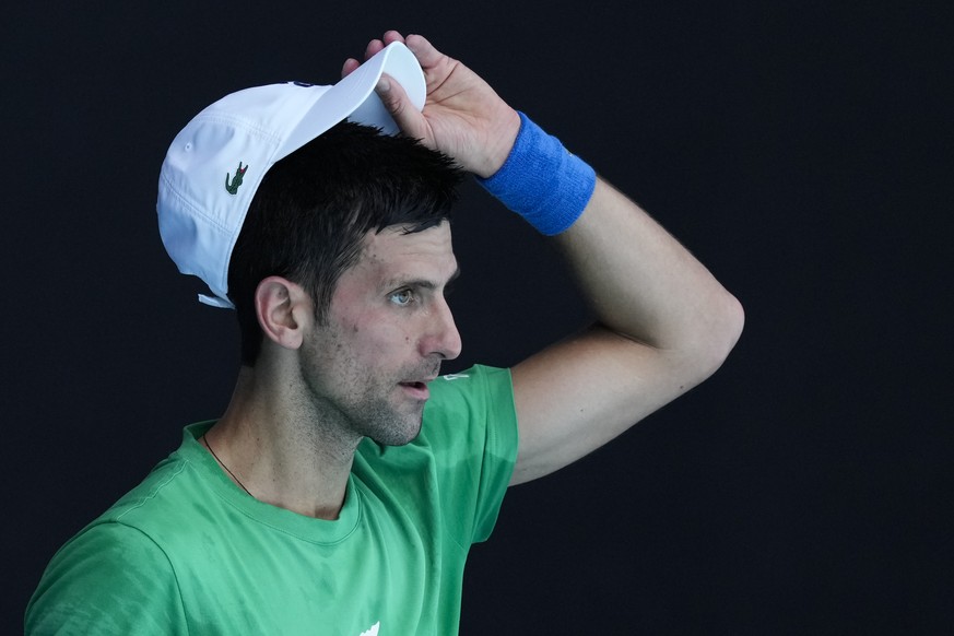 Defending men&#039;s champion Serbia&#039;s Novak Djokovic practices on Margaret Court Arena ahead of the Australian Open tennis championship in Melbourne, Australia, Thursday, Jan. 13, 2022. AP Photo ...