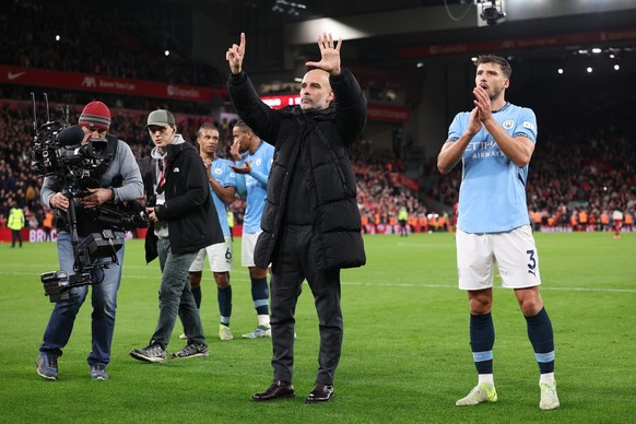 epa11752183 Manchester City manager Pep Guardiola gestures towards fans after the English Premier League match between Liverpool and Manchester City in Liverpool, Britain, 01 December 2024. EPA/ADAM V ...
