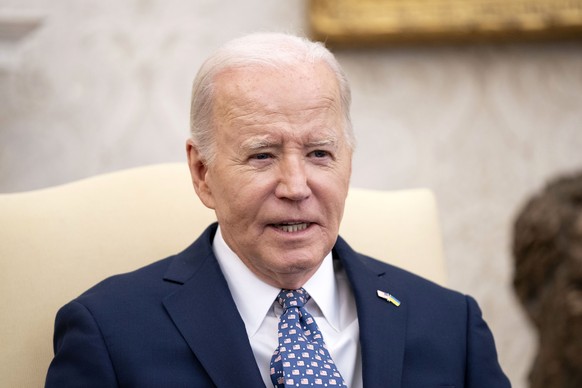epa11184900 US President Joe Biden speaks during a meeting with US vice president and congressional leaders in the Oval Office of the White House in Washington, DC, USA, 27 February 2024. EPA/BONNIE C ...