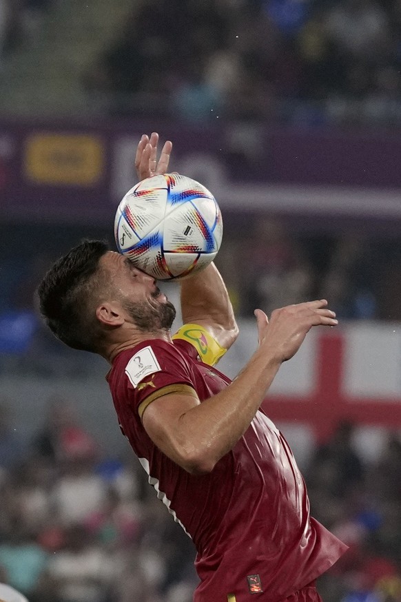 Serbia&#039;s Dusan Tadic heads the ball during the World Cup group G soccer match between Serbia and Switzerland, in Doha, Qatar, Qatar, Friday Dec. 2, 2022. (AP Photo/Ricardo Mazalan)