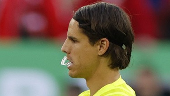Switzerland&#039;s Yann Sommer, right, Granit Xhaka, center, and Gregor Kobel, left, react after losing the penalty shoot-out of the quarter final match between England and Switzerland at the Euro 202 ...