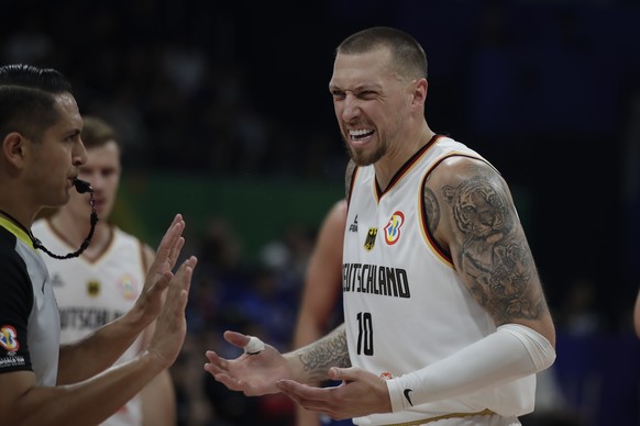 epa10852740 Daniel Theis of Germany reacts during the FIBA Basketball World Cup 2023 final match between Serbia and Germany at the Mall of Asia in Manila, Philippines, 10 September 2023. EPA/FRANCIS R ...