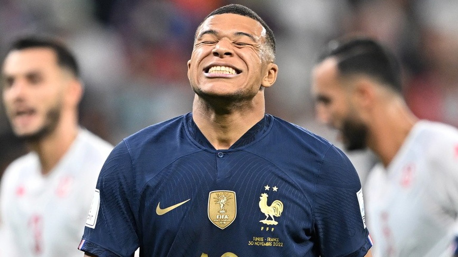 epa10339353 Kylian Mbappe of France reacts during the FIFA World Cup 2022 group D soccer match between Tunisia and France at Education City Stadium in Doha, Qatar, 30 November 2022. EPA/Noushad Thekka ...