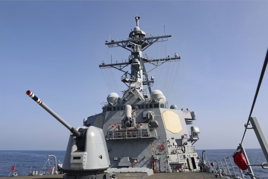 In this photo provided by the U.S. Navy, the Arleigh Burke-class guided-missile destroyer USS Milius (DDG 69) conducts a routine Taiwan Strait transit on Sunday, April 16, 2023. The U.S. Navy sailed t ...