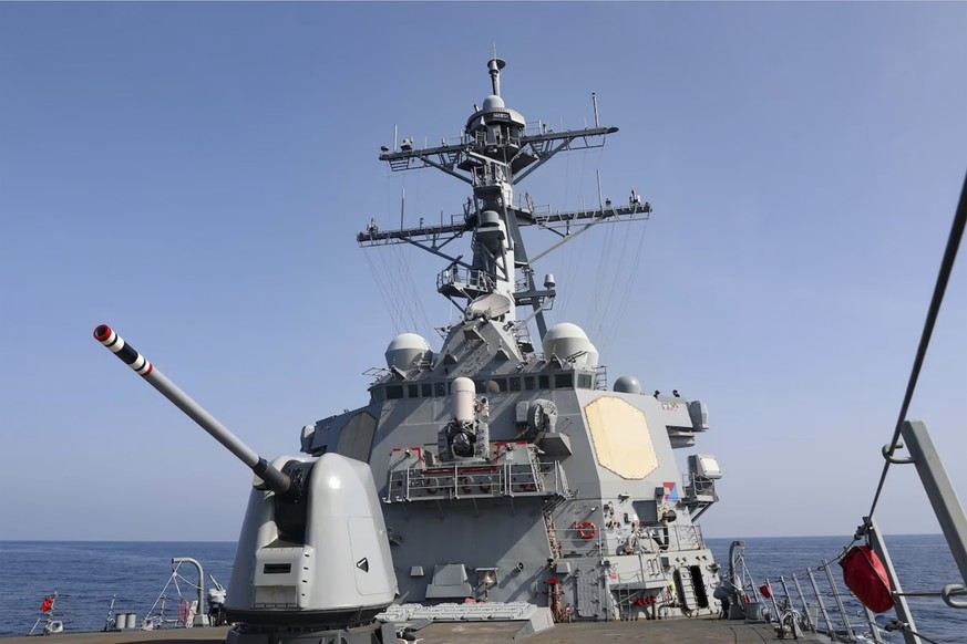 In this photo provided by the U.S. Navy, the Arleigh Burke-class guided-missile destroyer USS Milius (DDG 69) conducts a routine Taiwan Strait transit on Sunday, April 16, 2023. The U.S. Navy sailed t ...
