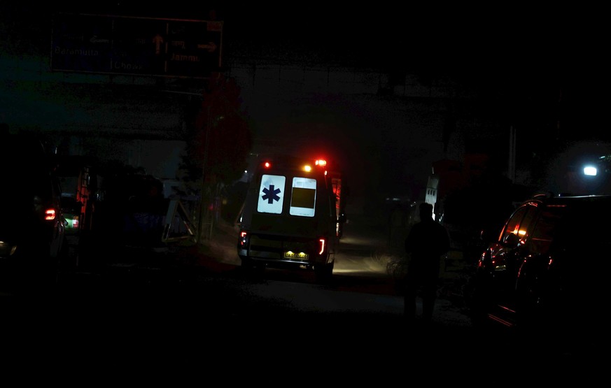 epa12527221 An ambulance carries a person injured in an accidental explosion in Srinagar, the summer capital of Indian Kashmir, 15 November 2025. Four people were killed and 27 others injured in an ac ...