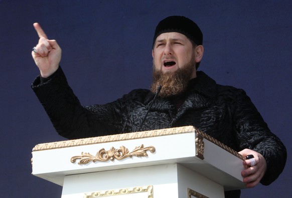 Regional leader Ramzan Kadyrov addresses a rally marking the 13th anniversary of the adoption of the Constitution of Russian region of Chechnya, in the regional capital of Grozny, Russia on Wednesday, ...