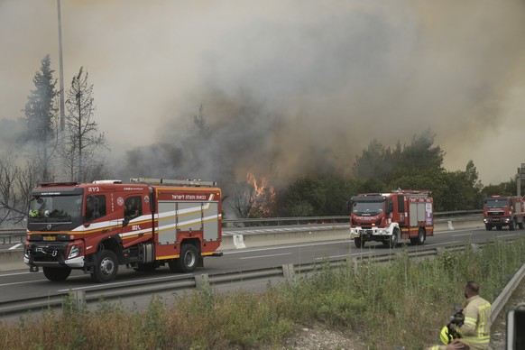 Firefighters work to extinguish a forest fire burning on a freeway to Jerusalem, Wednesday, April 30, 2025. (AP Photo/Mahmoud Illean)
Israel Wildfires