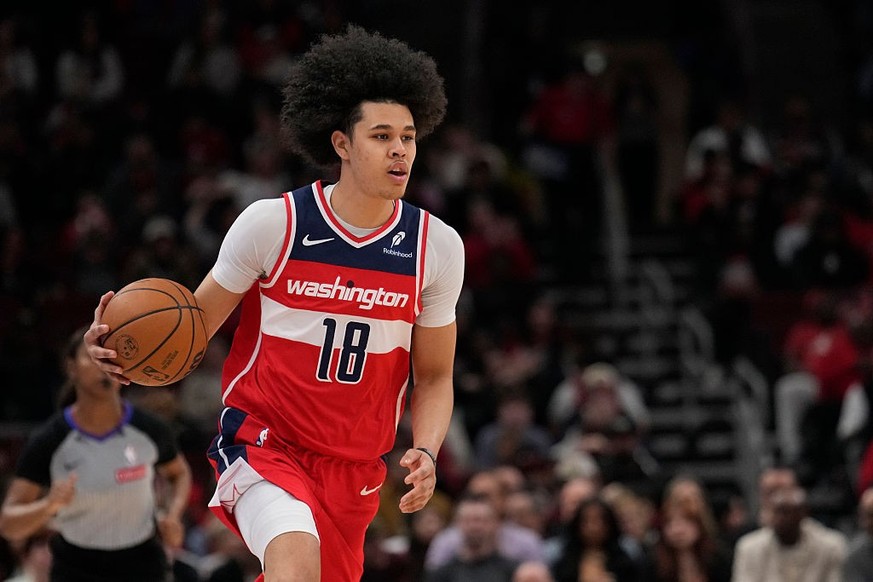 CHICAGO, ILLINOIS - APRIL 11: Kyshawn George #18 of the Washington Wizards dribbles the ball against the Chicago Bulls during the first quarter at the United Center on April 11, 2025 in Chicago, Illin ...