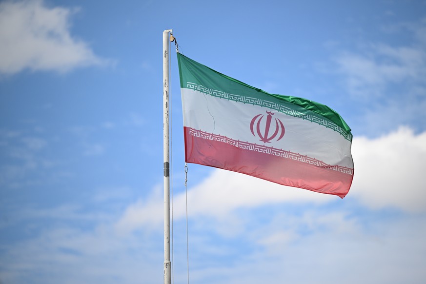 epa12322923 A flag flys at the Embassy of the Islamic Republic of Iran in Canberra, Australia, 26 August 2025. Australia expelled Iran's ambasador to Australia and suspended activities at the Aus ...