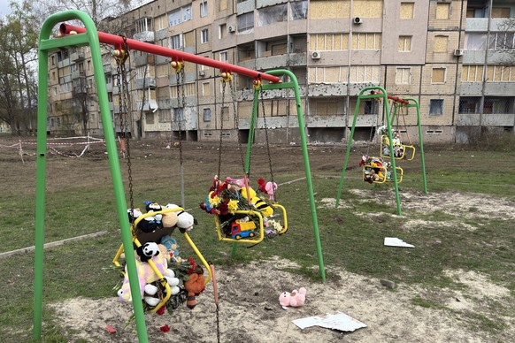 This photograph shows toys placed on swings in the courtyard of a residential building in Kryvyi Rig, central-eastern Ukraine, on April 7, 2025, days after a Russian missile strike that killed 20 peop ...