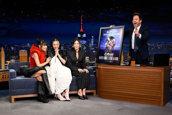 THE TONIGHT SHOW STARRING JIMMY FALLON -- Episode 2196 -- Pictured: (l-r) Singers Rei Ami, Audrey Nuna, and Ejae of &quot;KPop Demon Hunters&quot; during an interview with host Jimmy Fallon on Tuesday ...