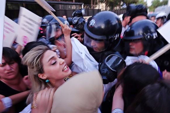 September 16, 2024, Diyarbakir, Turkey: Female protesters try to break though the police barricade during the Mahsa Amini commemoration in Diyarbakir. In Diyarbakir, Turkey, a group of Kurdish women w ...