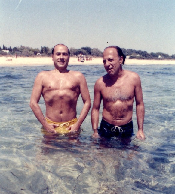 Silvio Berlusconi at the beach with Fedele Confalonieri in Hammamet in Tunisia in August 1984. There was even Bettino Craxi with them, but he is not in this photo. (Photo by Umberto Cicconi/Getty Imag ...