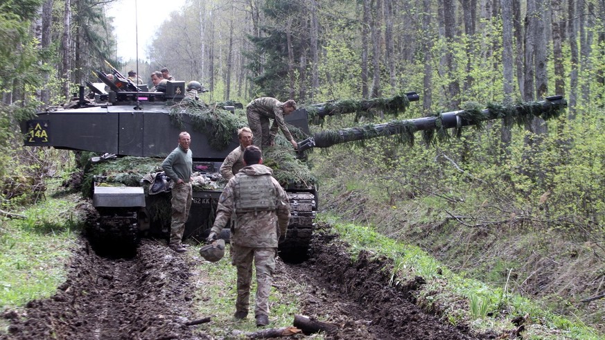 epa07554542 Soldiers with British main battle tank Challenger during Spring Storm exercise (Kevadtorm) near Sillamae, Estonia, 07 May 2019. Spring Storm is a large-scale military practice exercise of  ...