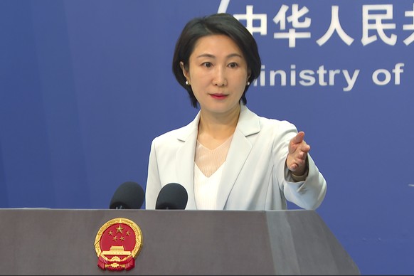 Chinese Foreign Ministry spokesperson Mao Ning gestures during a press conference at the Ministry of Foreign Affairs in Beijing, Wednesday, May 24, 2023. The Chinese government on Wednesday defended i ...