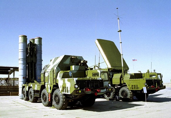 FILE - In this 2001 file photo, an S-300 air-defense missiles launcher, left, and a S-300 missiles guidance station, right, are seen at an undisclosed location in Russia. The Iranian defense minister  ...