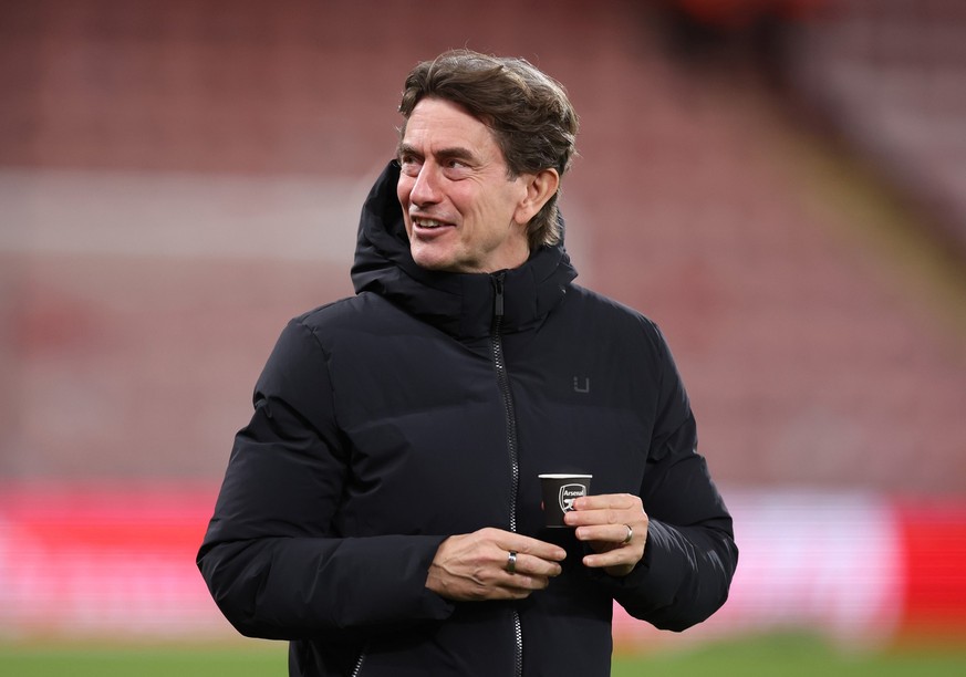 BOURNEMOUTH, ENGLAND - JANUARY 07: Thomas Frank manager / head coach of Tottenham Hotspur holding a cup with the Arsenal club badge on ahead of the Premier League match between Bournemouth and Tottenh ...