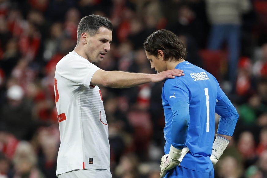 epa11239813 Switzerland&#039;s Fabian Schaer (L) talks to injured teammate Yann Sommer during the friendly international soccer match between Denmark and Switzerland, in Copenhagen, Denmark, 23 March  ...