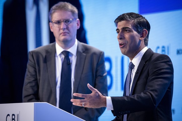 epa10317798 Britain&#039;s Prime Minister Rishi Sunak (R) answers questions with CBI director general Tony Danker (L) at CBI conference at The Vox conference centre in Birmingham, Britain, 21 November ...