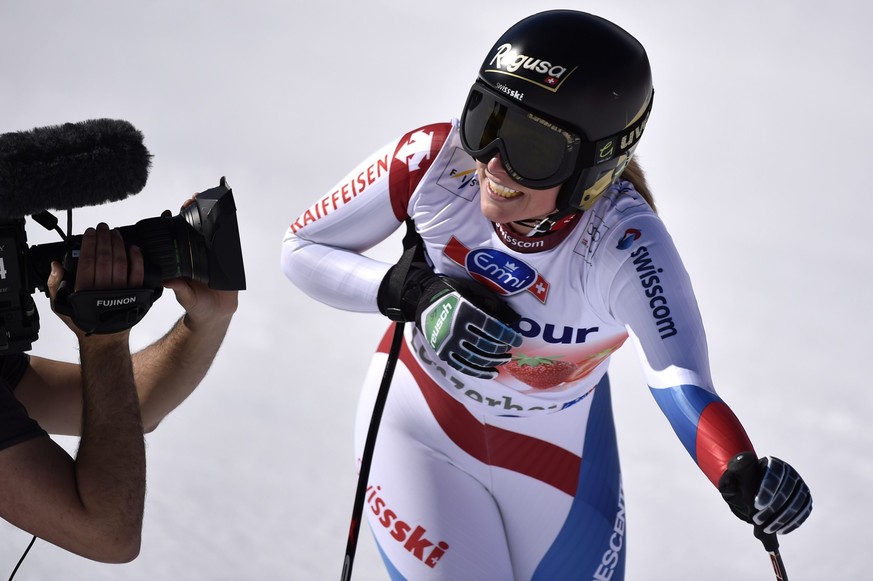 Lara Gut of Switzerland reacts in the finish area during the women&amp;#039;s downhill race at the FIS Alpine Ski World Cup finals, in Parpan-Lenzerheide, Switzerland, Wednesday, March 12, 2014. (KEYS ...