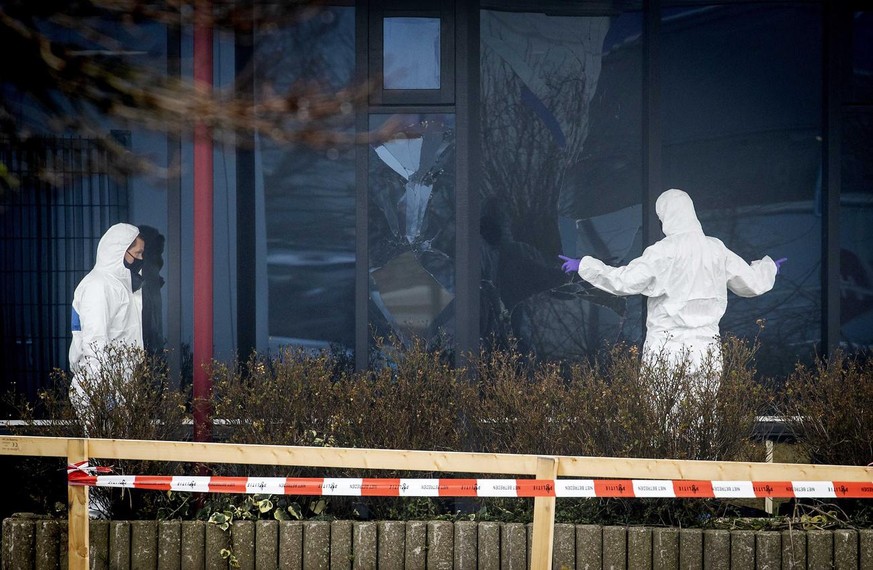 epa09048286 Investigators are on site at the coronavirus testing location in Bovenkarspel, North Holland, The Netherlands, where an explosion occured 03 March 2021. According to the police, no one was ...