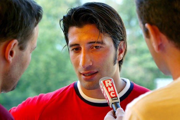 Hakan Yakin&#039;s brother Murat answers the questions of French radio reporters during a press conference of the Swiss soccer team one day before a friendly game vs France in Prangins, Switzerland, T ...