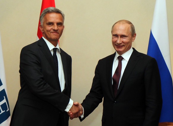 Swiss President and OSCE chairperson in office Didier Burkhalter, left, welcomes Russian President Vladimir Putin, for talks with the Organization for Security and Cooperation in Europe, OSCE, in Vien ...