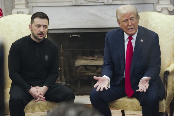 President Donald Trump, right, meets with Ukrainian President Volodymyr Zelenskyy in the Oval Office at the White House, Friday, Feb. 28, 2025, in Washington. (AP Photo/ Mystyslav Chernov)
Donald Trum ...