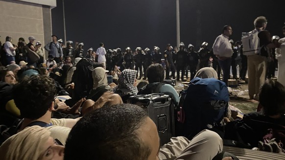 Propalestinian demonstrators surrounded by the Egyptian police. In addition, this swiss march gaza egypt this swiss march gaza egypt new