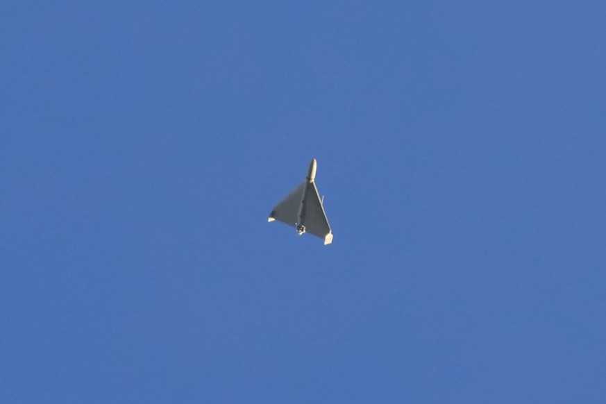 A drone is seen in the sky seconds before it fired on buildings in Kyiv, Ukraine, Monday, Oct. 17, 2022. (AP Photo/Efrem Lukatsky)