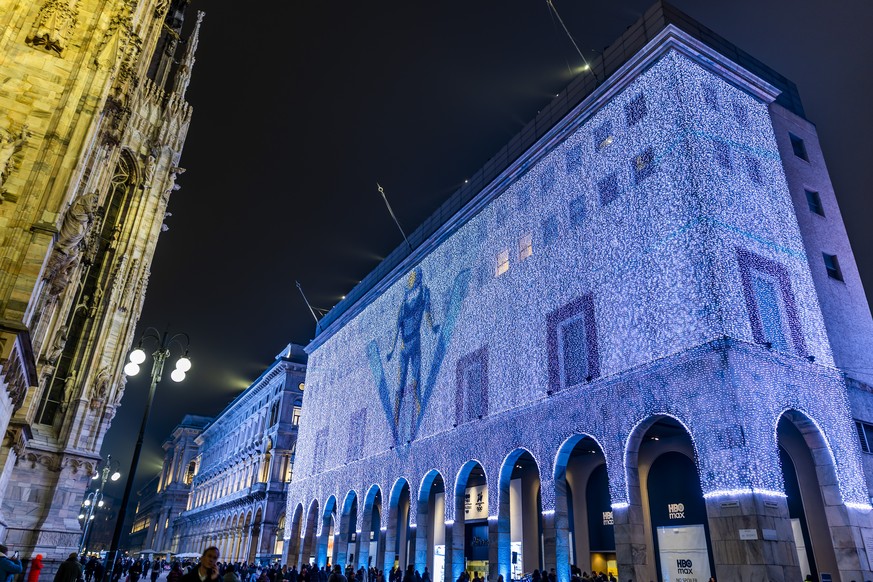 epa12703058 An illuminations representing Ski Jumping is displayed on the department store in Piazza Duomo ahead of the Milano Cortina 2026 Olympic Winter Games, in Milan, Italy, 03 February 2026. EPA ...