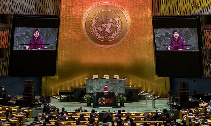 epa10194017 2014 Nobel Peace Prize Laureate Malala Yousafzai addreses the United Nations&#039; Transforming Education Summit being held in the General Assembly Hall at United Nations headquarters in N ...