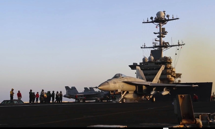This image taken from video provided by the U.S. Navy shows an aircraft launching from the USS Harry S. Truman in the Red Sea before airstrikes in Sanaa, Yemen, Saturday, March 15, 2025. (U.S. Navy vi ...