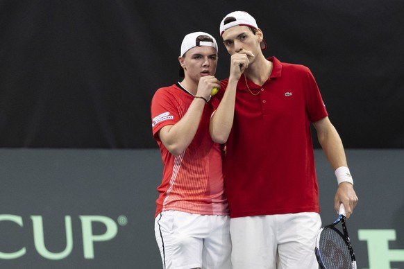 Switzerland&#039;s Dominic Stricker, left, and Marc-Andrea Huesler in the doubles match against Lebanon&#039;s Benjamin Hassan and Hady Habib during the Davis Cup playoff for World Group 1 in the Swis ...