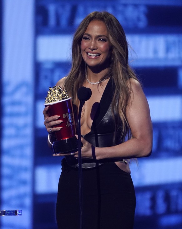Jennifer Lopez accepts the award for best song for &quot;On My Way (Marry Me)&quot; at the MTV Movie and TV Awards on Sunday, June 5, 2022, at the Barker Hangar in Santa Monica, Calif. (AP Photo/Chris ...