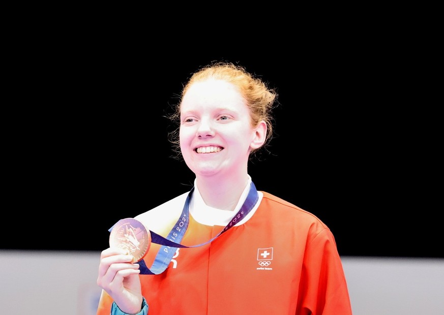 epa11505155 Bronze medalist Audrey Gogniat of Switzerland poses during the medal ceremony for the 10m Air Rifle Women event of the Shooting competitions in the Paris 2024 Olympic Games at the Shooting ...
