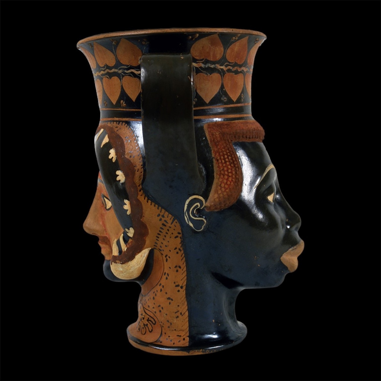 Vase en céramique, «canthare», avec la tête d’un Européen et d’un Africain, 480-470 av. J.-C.
https://www.museivaticani.va/content/museivaticani/en/collezioni/musei/museo-gregoriano-etrusco/sala-xix-- ...