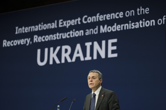 Swiss President Ignazio Cassis delivers his speech during the International Expert Conference on the Recovery, Reconstruction and Modernisation of Ukraine, in Berlin, Germany, Tuesday, Oct. 25, 2022.  ...