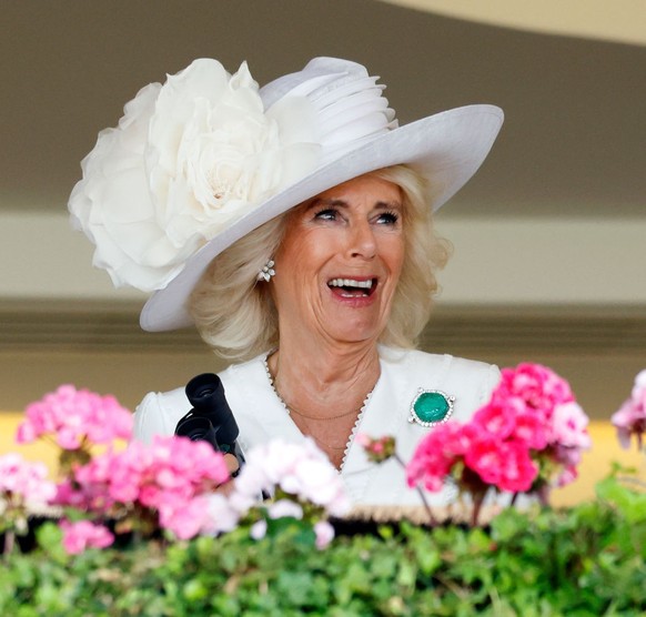 ASCOT, UNITED KINGDOM - JUNE 20: (EMBARGOED FOR PUBLICATION IN UK NEWSPAPERS UNTIL 24 HOURS AFTER CREATE DATE AND TIME) King Charles III and Queen Camilla watch, from the Royal Box, their horse &#039; ...